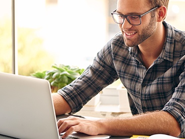 Young man using laptop